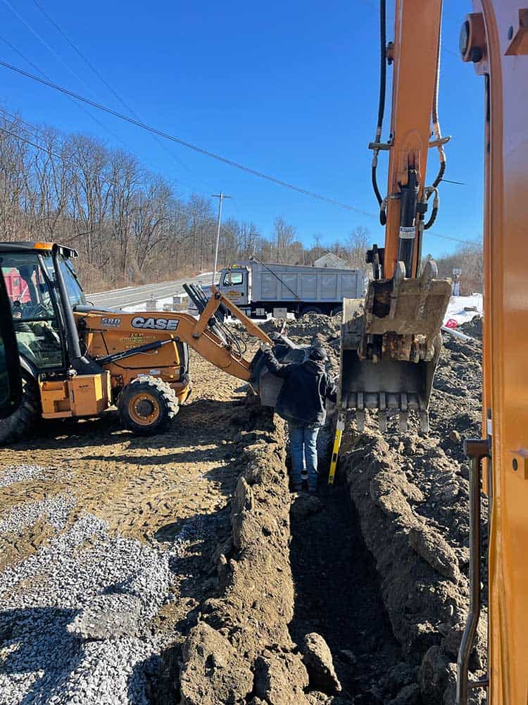 Installing new sewer line by J&R Contracting of Hudson, NY