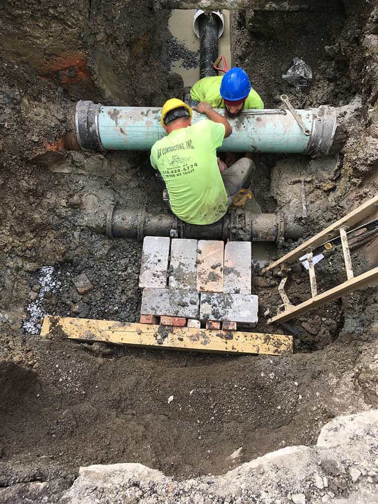 Sewer repair work by J&R Contracting of Hudson, NY